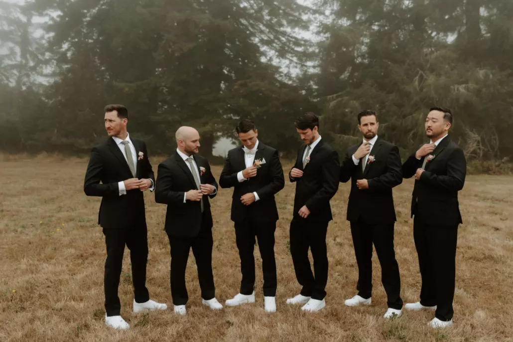 the groomsmen suting up the groomsmen suiting up