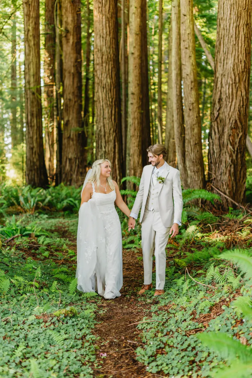 couple in the redwood forest grove
